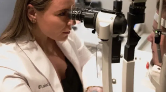 Careers stewardship image showing an eye doctor performing an eye scan.